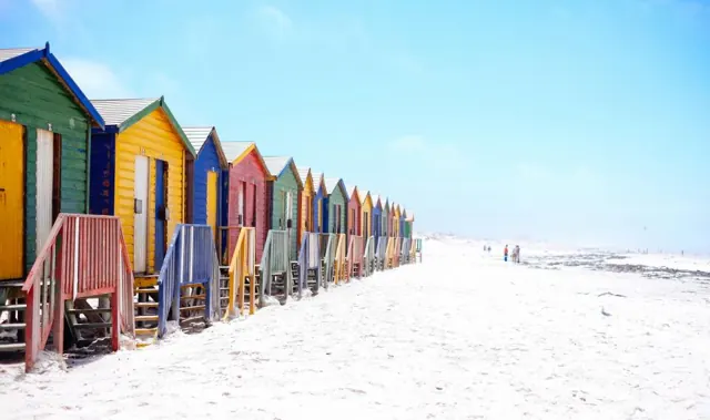 Colorful beach houses by the sea