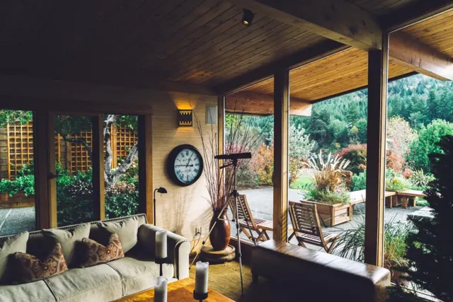 Covered porch with a garden view